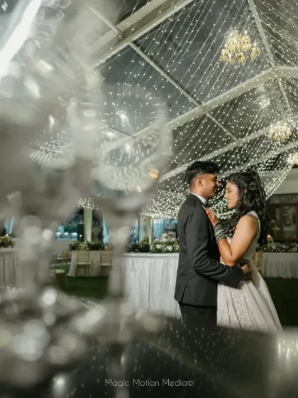 A candid moment on their personalized dance floor. We love creating spaces where couples can be themselves, and this custom stage with their initials was the perfect spot for a spontaneous dance.