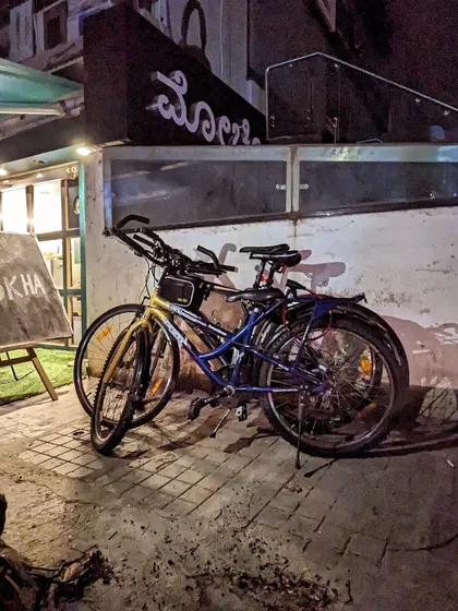 Our cycles taking a break outside a cafe in Indiranagar. This stack represents a pause for lemon tea and good conversation during our Christmas ride.