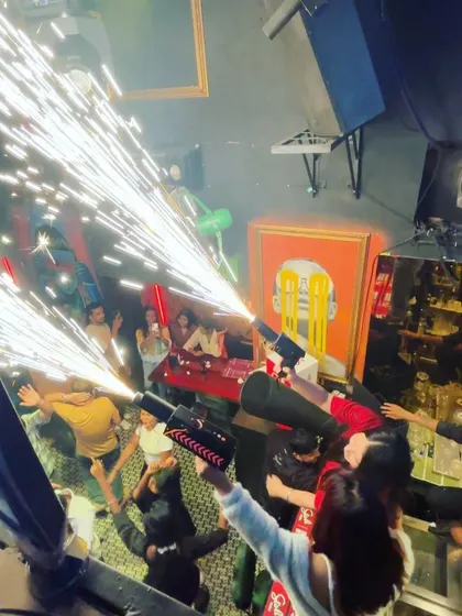 Partygoers taking control of the cold pyro guns, becoming part of the show themselves. It's all about interactive fun.
