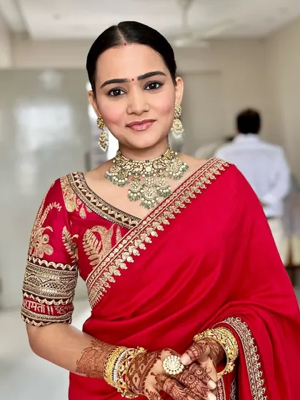 A beautiful, happy shot of the final look. The simple makeup allows her joyful expression and stunning jewellery to be the main focus.