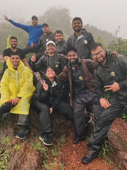 A happy, rain-soaked team on the Kodachadri trek. The monsoon season transforms the Western Ghats into a lush, green paradise, perfect for adventure lovers.