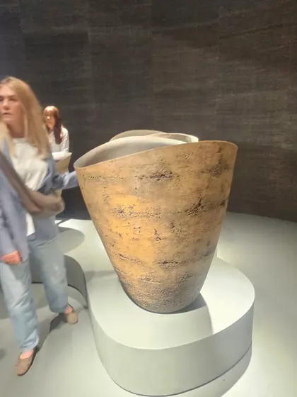 A closer look at one of our large, handcrafted planters. The textured, weathered finish gives it a unique character that enhances the beauty of the plant it holds.