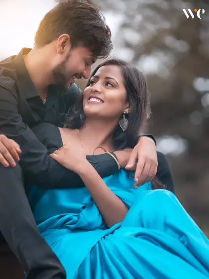 A loving gaze shared between the couple. This pre-wedding portrait is all about capturing the connection and happiness that radiates from them.