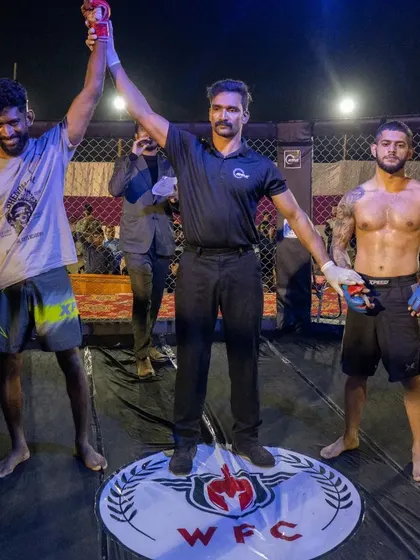 The official win photo from my co-main event at WFC International Pro Fight Night 3. Securing another first-round finish is what I train for.