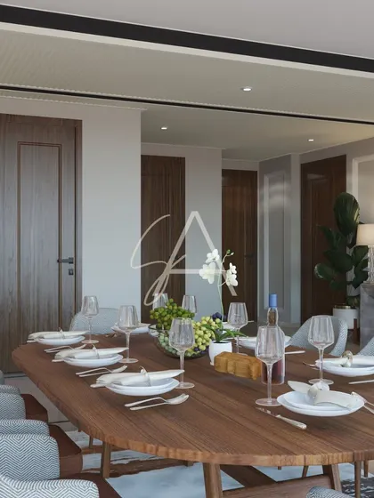 A close-up of a beautifully set dining table, ready for guests. I believe that the details matter, from the choice of dinnerware to the centerpiece, in creating a memorable dining experience.