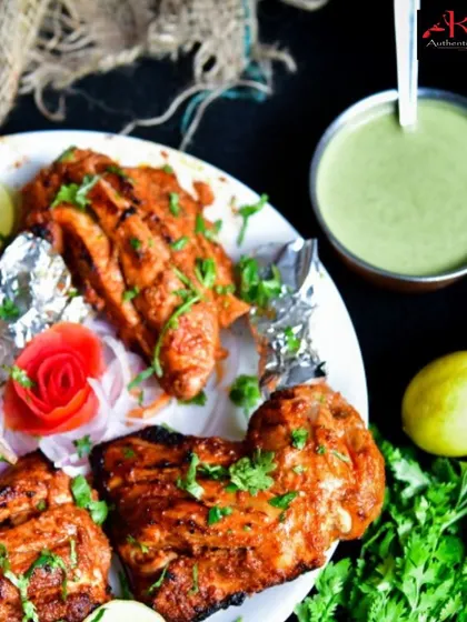 Our classic Tandoori Chicken, marinated for hours and cooked in the clay oven. It's a timeless dish that is always a hit at any gathering.
