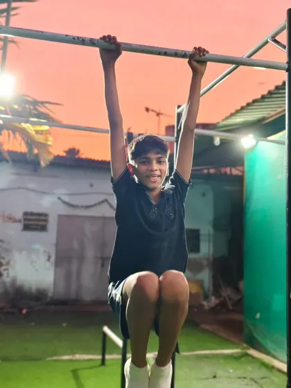 Another one of our CaliKids working on his hanging skills, building the upper body and core strength needed for calisthenics.