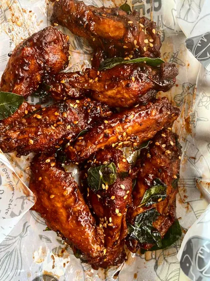 My Inji Puli Chicken Wings are a whirlwind of flavors. One bite hits you with gingery heat, jaggery sweetness, the tartness of tamarind, and fiery chilies. They are juicy inside, crispy outside, and perfect for any occasion.