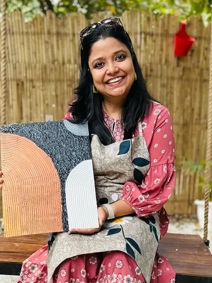 Look at that smile! This is the result of our Texture Art workshop. She created a beautiful, modern abstract piece to take home, and more importantly, she discovered a new way to express herself. I love seeing the pride and joy on everyone's faces.