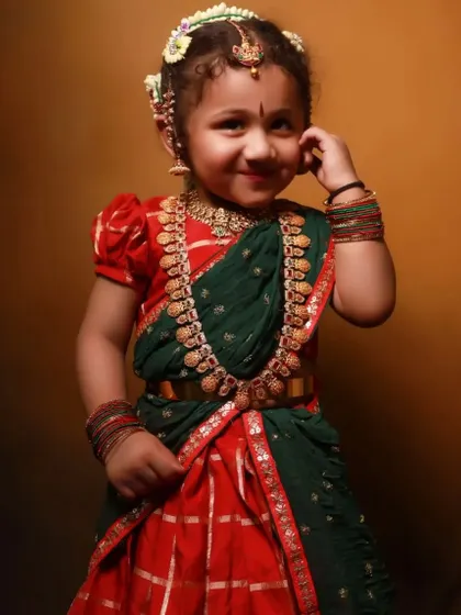 A little girl looking so cute in a traditional half-saree. I custom design and stitch ethnic wear for children for festivals and special occasions.