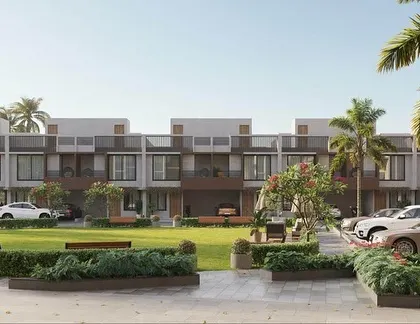 An architectural render of a housing complex centered around a large community lawn. This view highlights the landscaping and shared amenities that are integral to my habitat design philosophy.