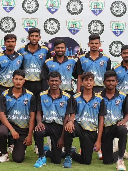 A formal team photo of the visiting NSC Hyderabad team in front of the tournament backdrop.