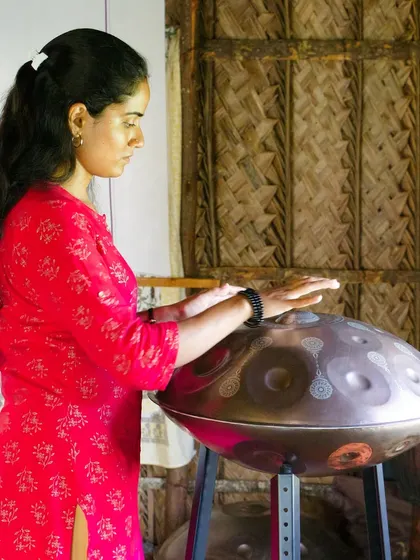 A student connects with the handpan during our training. This instrument is a favorite for its intuitive nature and deeply meditative tones.