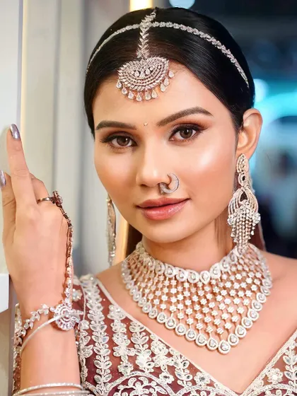 A detailed shot of the diamond-studded bridal look from our Pro Course. We provide personalized attention to help every student master intricate details and create flawless makeup.
