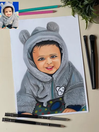 A super cute baby in a bear hoodie, drawn on A4 paper. The colored pencils helped me create the fuzzy texture of the suit, making the portrait feel cozy and warm.