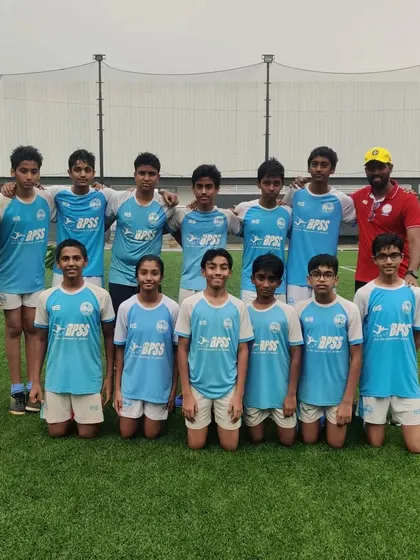 Our U-13 team posing with their coaches before a TFP Cup match.