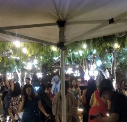A view of the party from under the DJ tent.