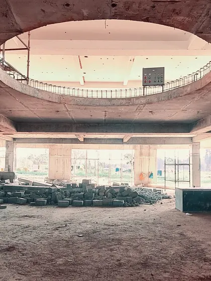 A raw concrete structure on one of our campus design projects, showcasing the beauty of pure geometry before the finishing layers are applied.