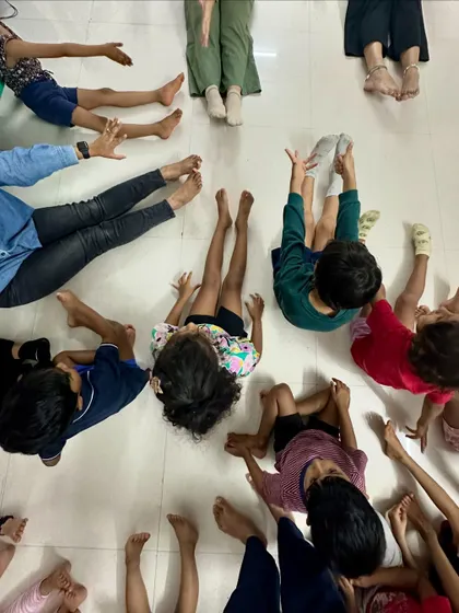 An overhead view of our yoga circle. Yoga helps children develop strength, flexibility, and concentration, all while being a calming and centering activity in their busy day.