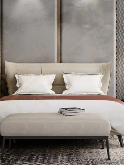 A bedroom designed for ultimate relaxation, blending luxurious textures like velvet and silk with modern, sculptural lighting.