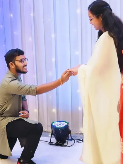 A sweet proposal moment during an engagement ceremony. My services often go beyond just the dance, helping to plan these special surprises.