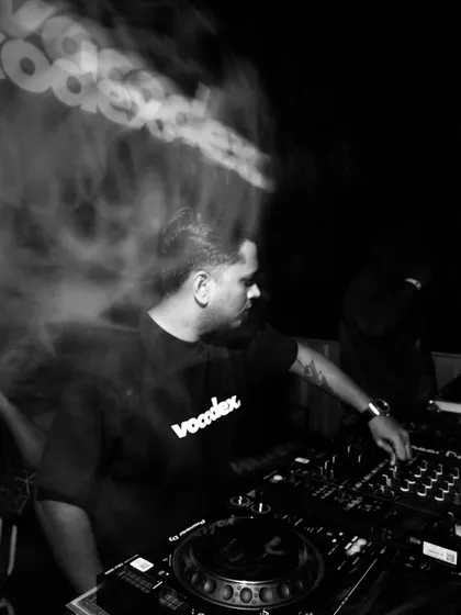 An artistic shot of me in the zone, with a motion blur effect capturing the energy of the club. This photo really conveys the feeling of being lost in the mix.