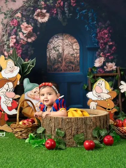 Another adorable shot of Snow White with the seven dwarfs, set against a magical forest backdrop.