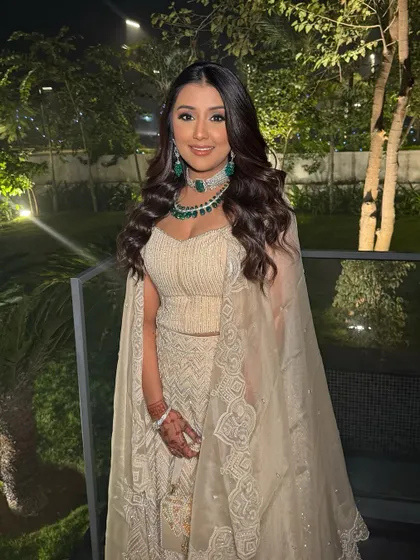 Slaying the night away! Urvi is glistening in this uber-glam look, perfect for a cocktail party or reception. The makeup is radiant and designed to make a statement.