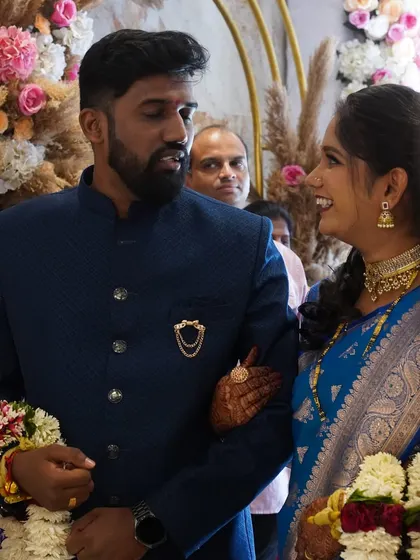 Another happy moment shared by the couple. The bride's makeup is fresh and radiant, reflecting the joy of the occasion.