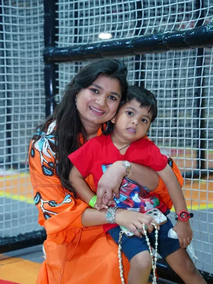 A mother gives her son a warm hug. These are the beautiful, candid moments we love to see at Wobble World.