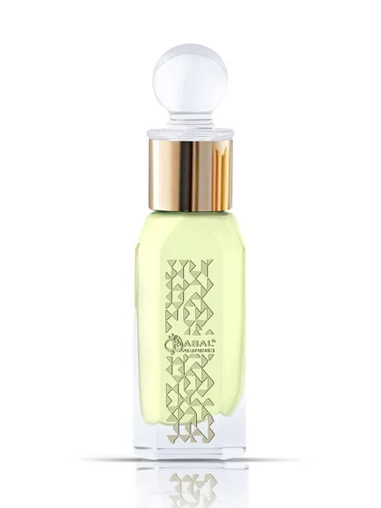 The attar bottle shot by itself, focusing on its unique shape and branding.
