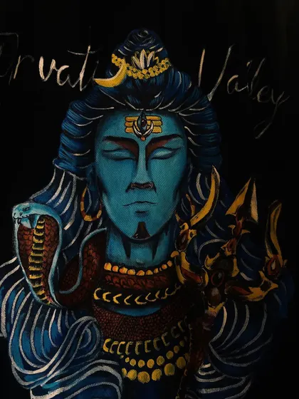 A close-up of the Lord Shiva portrait. This view lets you appreciate the detailed line work in his hair, the texture on the serpent, and the careful shading that gives his face dimension.