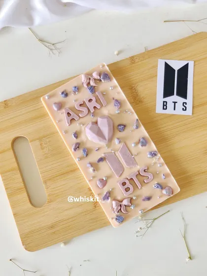 A custom BTS-themed chocolate bar from 2022. I love creating personalized chocolate bars for fans of all kinds.