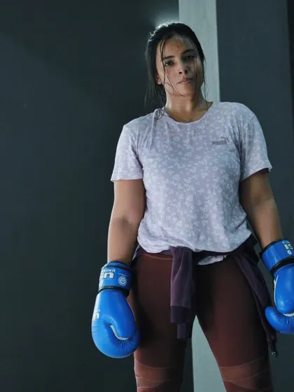 A boxer, tired but proud, after a hard session. This is the look of accomplishment.