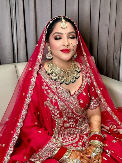 A beautiful candid moment showing the shimmering eyeshadow and perfectly blended base. This look was all about classic glamour.