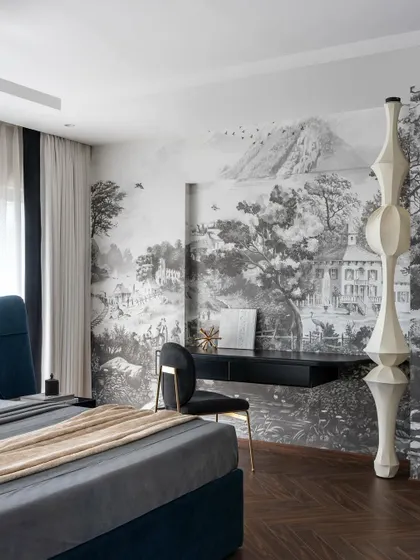 A full view of the Evelyn master bedroom, showing how the large mural creates an immersive experience. The floating desk is seamlessly integrated into the design, providing a functional workspace without disrupting the room's aesthetic.