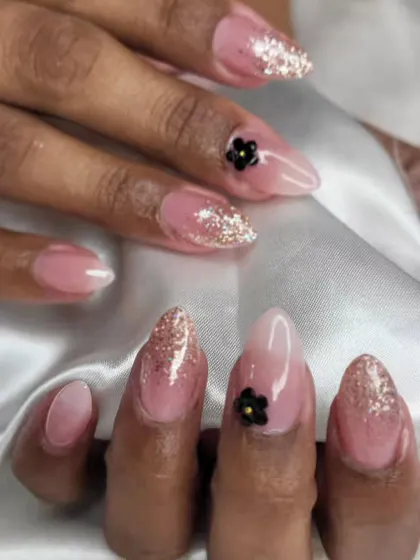 Another view of the falling glitter and black flower design. The combination of sparkle and delicate details is so elegant.