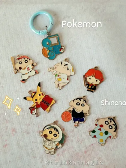 More character charms. This collection includes various Shinchan designs and a Pikachu, perfect for anyone who loves these classic anime characters.