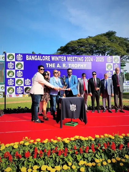 Mr. Ashok Ranpise presents The A.R. Trophy to the winning connections.