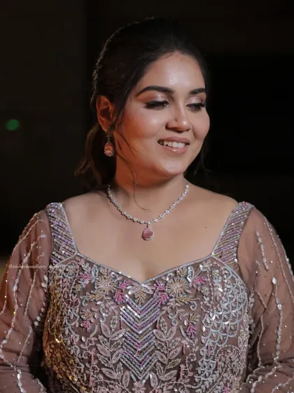A beautiful smile from a happy client. This sangeet look is all about soft glamour and radiant skin.