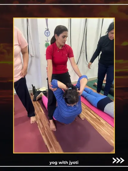 A hands-on assist to help a student deepen their Matsyasana (Fish Pose), opening the chest and throat.