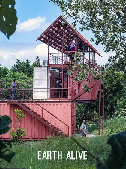 The Earth Alive project is our experiment in sustainable design, using repurposed shipping containers to create a dynamic, multi-level space that encourages play and connection with the wild landscape.