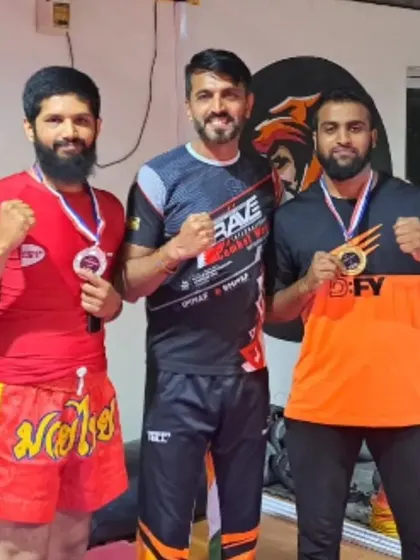 Our Coach Srinivas and fighter Umar Farooq representing Fight Capital India with their medals after a great performance at the FitFlix Expo 2023.
