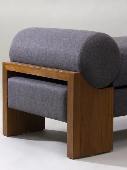 This mid-century daybed is the ultimate relaxation haven. Its clean lines, solid wood frame, and comfortable mattress make it a versatile piece for lounging or as an extra guest bed.