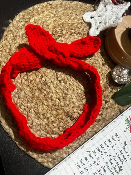 Another look at the versatile red bow hair tie. It’s a simple way to make your ponytail look extra special.