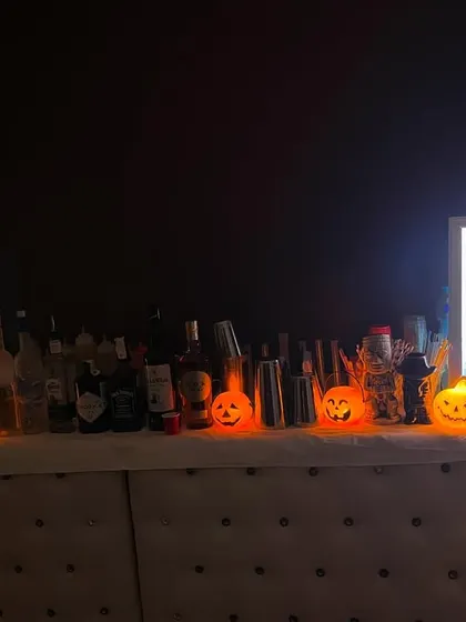 The full view of our Halloween bar, complete with glowing pumpkins and our illuminated 'BAR' sign.