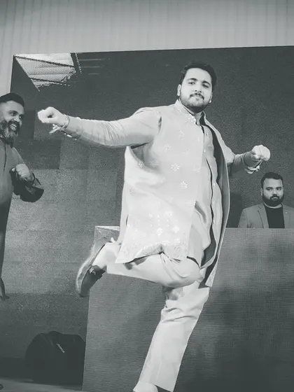 A dynamic action shot of the groom's performance. We focus on creating high-energy moments that look amazing on camera.