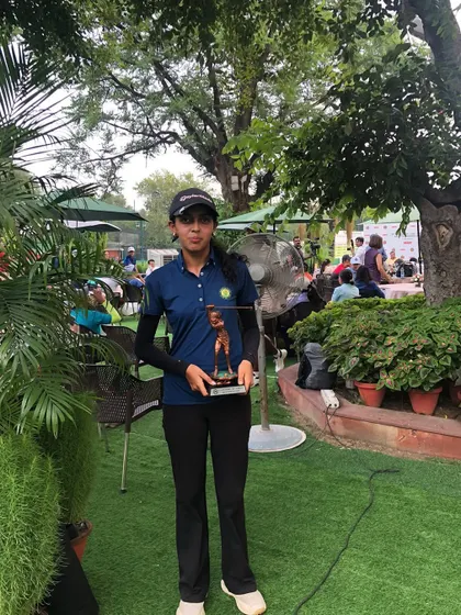 Smira Bhambri poses with her Runner-Up trophy at the 15th DGC Junior Golf Tournament. Her steady rounds at the Delhi Golf Club showcased her consistency.