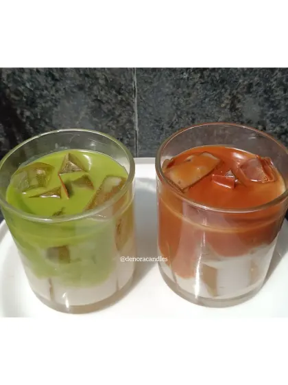 For the beverage lovers, I make these realistic drink candles. Here are my iced matcha latte and iced coffee candles, both made with layered soy wax to create a stunning visual effect.