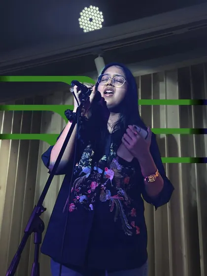 A vocalist captures the audience's attention. Our intramural events are designed to be a confidence-building experience for every student, regardless of their skill level.
